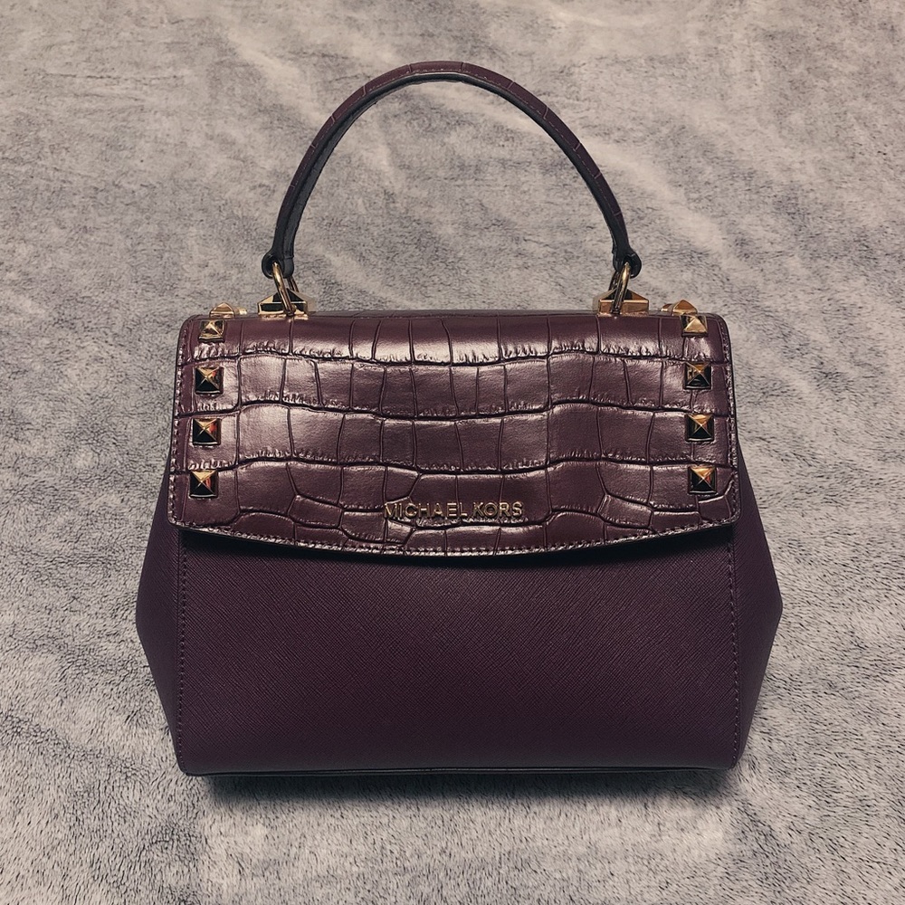royal purple michael kors leather handbag with gold studs